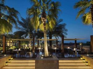 Couples can enjoy an intimate dinner under the stars in the pool cabana set up.