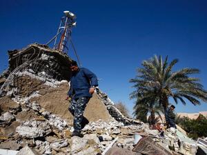 A man surveys the debris of the al-Fateh mosque, bombed by militants in Iraq earlier this year. (AFP/File)