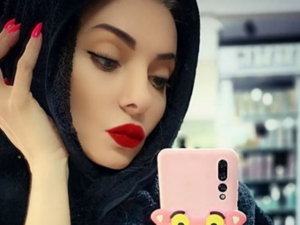 The Lebanese beauty captioned the picture 'This is a towel you idiots, I am drying my hair' (Source: myriamklinkk - Instagram)