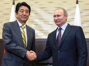 Russian President Vladimir Putin (right) shakes hands with Japanese Prime Minister Shinzo Abe during a meeting on the sidelines of the Eastern Economic Forum. (AFP/ File)