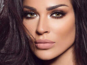 نادين نسيب نجيم تخطف الأنظار ببدلة عصرية من تصميم ألكسندر فوتييه

