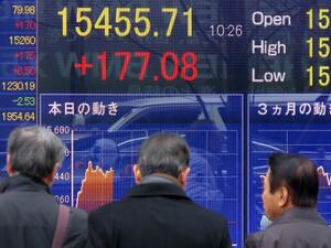 Japan's Nikkei 225 index fell 7.1 percent to 21,087.71 by early Tuesday afternoon, after a wild day for U.S. stock markets. (AFP) Japan's Nikkei 225 index fell 7.1 percent to 21,087.71 by early Tuesday afternoon, after a wild day for U.S. stock markets. (AFP)