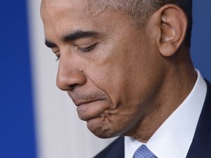 US President Barack Obama pauses as he speaks during a previously unannounced appearance in the Brady Briefing Room of the White House on April 23, 2015 in Washington, DC. (AFP/Mandel Ngan)