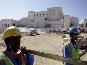 Foreign laborers working in road construction in Oman. (AFP) Foreign laborers working in road construction in Oman. (AFP)