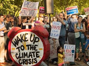 Protesters in Washington DC protest against Donald Trump's decision to withdraw the US from the Paris climate accord on June 2, 2017. (AFP) Protesters in Washington DC protest against Donald Trump's decision to withdraw the US from the Paris climate accord on June 2, 2017. (AFP)