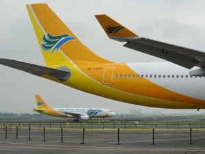 Filipino low-cost airline Cebu Pacific is suspending operations to and from Kuwait, Riyadh and Doha, claiming that these routes are no longer viable. (AFP/ Jay Directo) Filipino low-cost airline Cebu Pacific is suspending operations to and from Kuwait, Riyadh and Doha, claiming that these routes are no longer viable. (AFP/ Jay Directo)