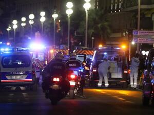 Rescue workers arrive on the scene after the deadly attack on Bastille Day revelers in Nice, France. (AFP/Valery Hache)