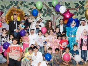 NBK Public Relations Team and a number of NBK Staff with the Childre