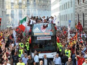 The team toured Milano in an open bus while fireworks went off in the colours of the Italian flag in front of 80,000 supporters