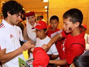 Pato meets his young fans during AC Milan’s visit to Beijing