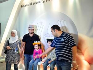 A family during FGB and LIC awareness event