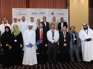 The four winning group of students with their supervisors, sponsors and organizers
