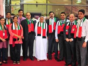 Abdulhamid Mohammed Saeed, Managing Director with FGB employees during the event