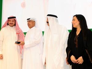 Abdulwahed Juma, Head of Corporate Affairs at FGB recieves award during ceremony