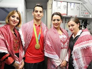 RJ staff delighted to accompany gold medalist Abu Ghoush on Paris-Amman flight