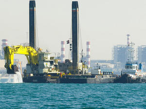 An Abu Dhabi Ports Company dredger at work off the Emirate's shoreline