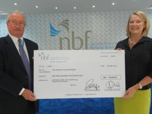 Alan Maitland Smith, Chairman of NBF’s CSR Committee handing over the cheque to Angel Appeal in support of seafarers off the coast of Fujairah