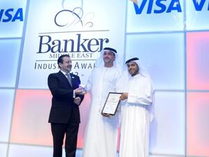 Ala’a Eraiqat, the CEO of Abu Dhabi Commercial Bank receiving the award