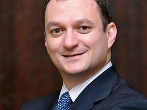 Chadi N. Moujaes, a partner with Booz & Company