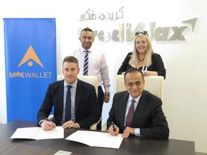 The signing ceremony took place at CrediMax HQ