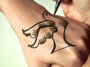 The dove represents the wish for a quiet peace during the heat of battle