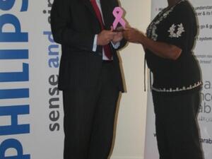 Diederik Zeven, General Manager of Philips Healthcare Middle East receives the award from BCA