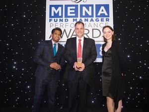 Dr. Husayn Shahrur, NBK Capital’s Managing Director of Regional receiving the award.
