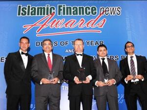 DIB collecting the award during a ceremony held at the Dusit Thani Hotel in Dubai