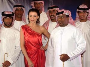 Etihad brand ambassador Dannii Minogue with traditional Emirati dancers at Etihad’s cocktail reception in Melbourne