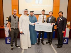 Emirates NBD senior managers and Dubai Expo 2020 Ambassadors with the winners of “Banker for a Day” and their family members