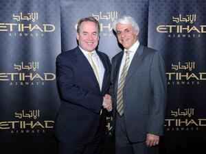James Hogan, CEO, Etihad Airways and Michel Taride, President Hertz International, Executive Vice President, Hertz Corporation celebrate the new global partnership