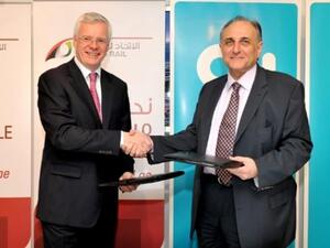 Richard Bowker, CEO of Etihad Rail, and Osman Sultan, CEO of du