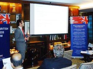 Tim Hawkins of E&Y International during his presentation