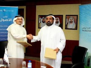 Salem Al Qubaisi, acting Chief Executive officer of Abu Dhabi Retirement Pensions & Benefits Funds and Dhafer Luqman Head of Products & Retail International at ADIB