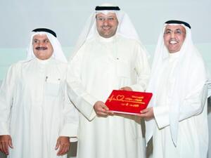 Mr. Fawzy Al-Thunayan, General Manager, Board Affairs at Gulf Bank accepting the token of appreciation from the Minister of Health Dr. Ali Al-Obaidi and Faisal Al-Mutawa, Chairman of the Kuwait Heart Foundation