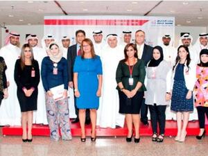 Surour Alsamerai, General Manager, Human Resources and Aly Shalaby, General Manager, Consumer Banking Group at Gulf Bank along with employees after receiving their certificates