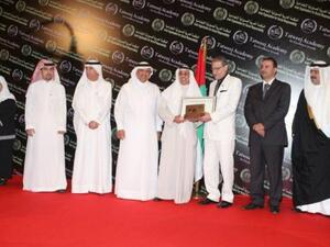 Mr. Fawzy Al-Thunayan, General Manager, Board Affairs at Gulf Bank accepting the award on behalf of the Bank during the awards ceremony