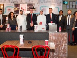 Management of Gulf Bank, Costa Coffee and MasterCard with their teams during the signing ceremony