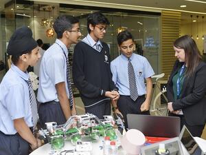 GEMS Education students participating in student versus business challenge at GEMS Xhibit event. 