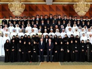 James Hogan, President and Chief Executive Officer of Etihad Airways, Ray Gammell, Chief People and Performance Officer, and the new graduating class upon receiving their recognition today