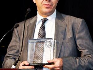 Carlos Ribeiro, Chief Financial Officer at Gulf Bank accepting his award at the ceremony