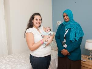Dr. Amani Saeed Ibrahim (right) with the mother of the baby