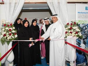 HMC officials cut the ribbon to declare the exhibition open 