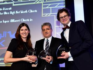 Malek Khalife, NBK's General Manager, Private Banking Group receiving the three awards from Euromoney