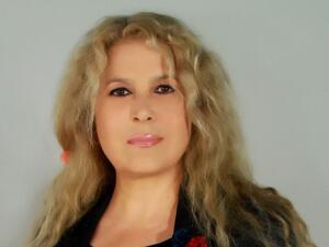 Nahla Nana, Director-Research and Innovation of Orient Planet Research and Marketing Consultant for Dubai Real Estate Institute of Dubai Land Department
