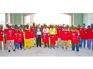 Oriental Enterprises workers celebrating the environmental safety award
