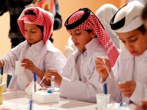 Children take part in a specially-designed national day experiment in Qatar Foundation’s Darb El-Saai tent