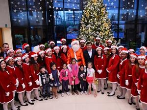 Good old jolly Santa Claus made a surprise appearance during the celebration and handed out gifts for the kids.