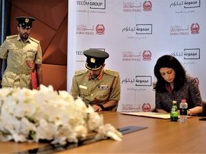 The first of their kind in the region, the smart police stations will offer smart services round-the-clock, including allied services that will operate without any human intervention.  (Pictured here: Major General Abdullah Khalifa Al Marri, Commander-in-Chief of Dubai Police, and Dr. Amina Al Rustamani, Group CEO of TECOM Group.)