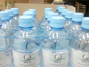 The Ministry of Commerce and Investment announced the closure of a factory in Buraidah for refilling Zamzam water bottles with normal water. (The Saudi Gazette)